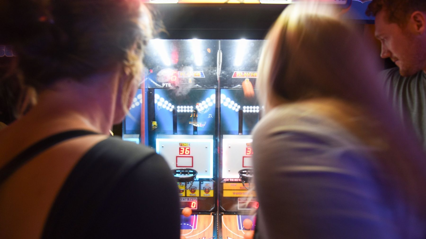 Head-to-head pop-a-shot basketball at Play Pensacola